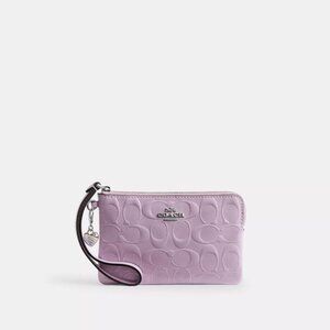 Coach Corner Zip Embossed Patent Signature Wristlet Lt Violet with Heart Charm